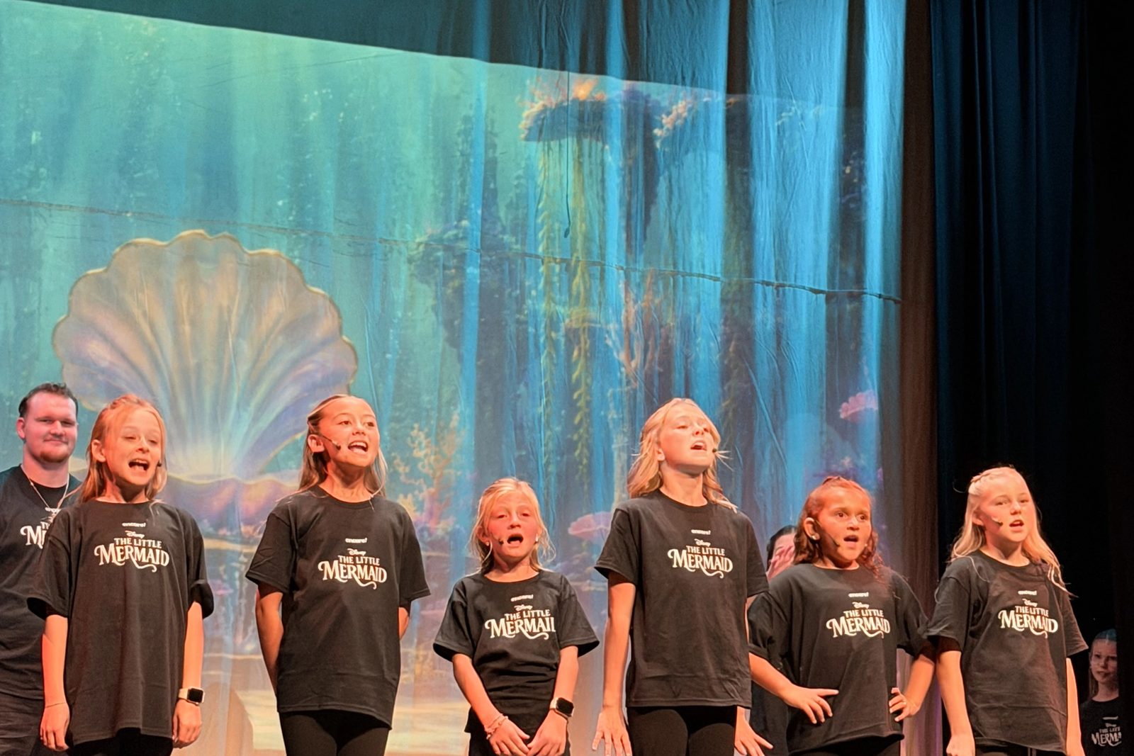 The Little Mermaid Jr. Camp cast performing on the Electric Theater stage