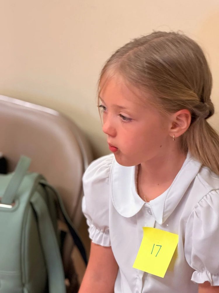 A Young Artist getting ready during camp