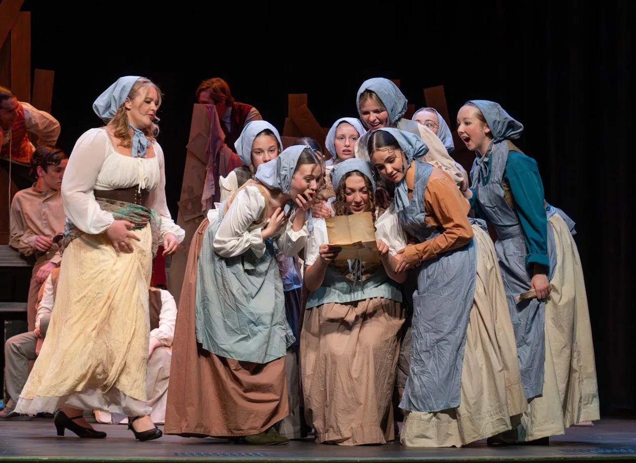 Encore cast members in costume in Encore's production of Les Misérables